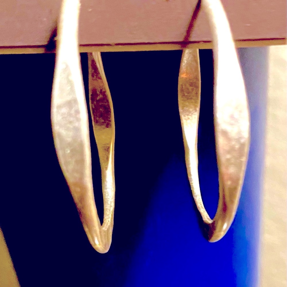 Brushed silver medium hoop earrings. Organic shape, artisan quality.